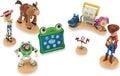 Official Toy Story 5 Figure Set –7 Fully Sculpted Disney Figures Including Woody, Buzz, Forky, Lilypad, Bullseye, Jessie & Tech Trio in Double-Tiered Box with Scenic Backgrounds